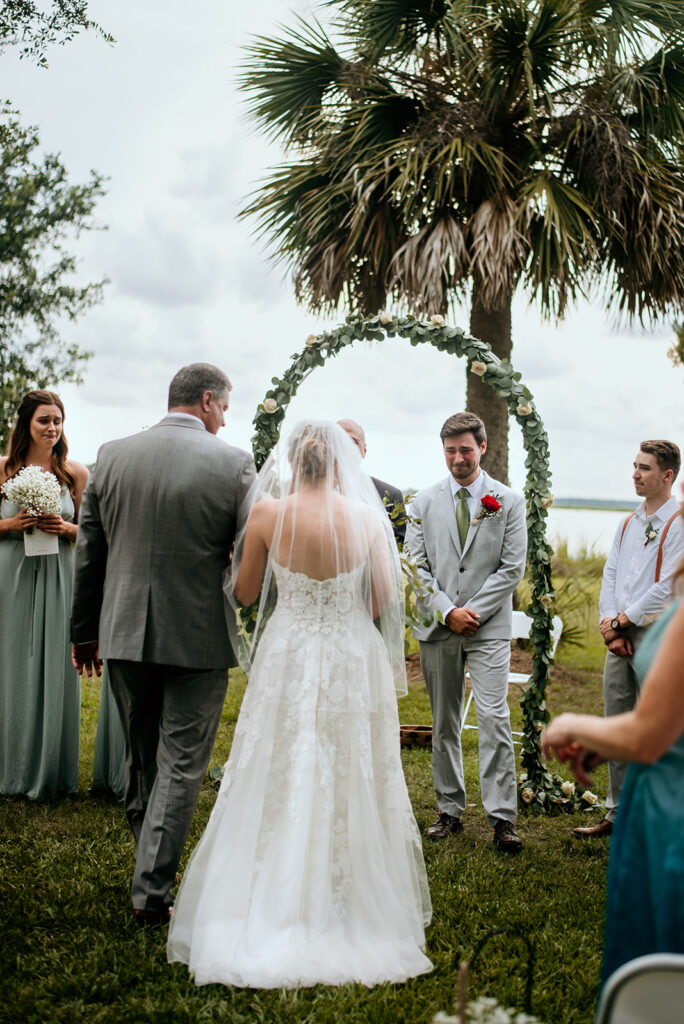groom reacting to bride for the first time at saint simons island