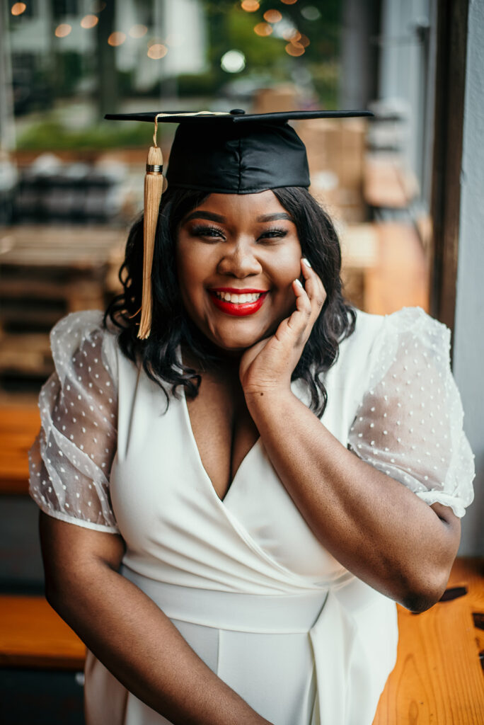 UGA grad by the window