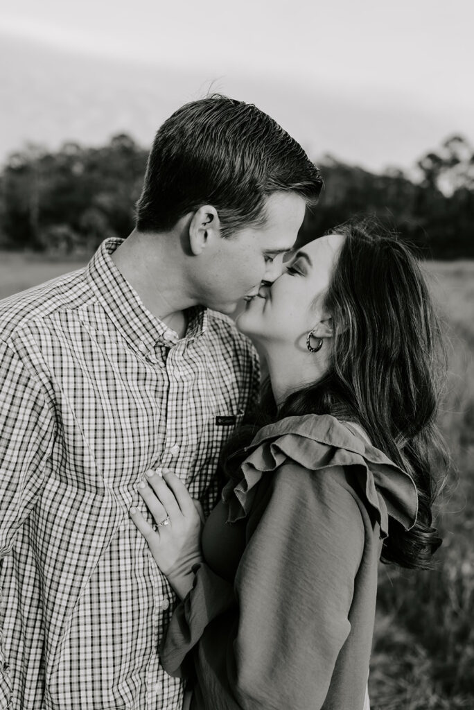 close up shot of couple kissing at skidaway island state park