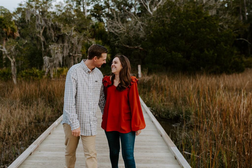 engaged couple laughing at skidaway island engagement session