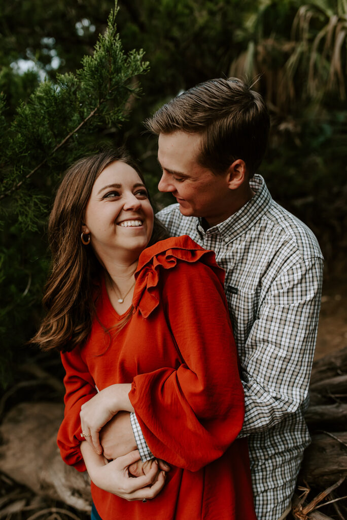 engaged couple laughing at skidaway island engagement session