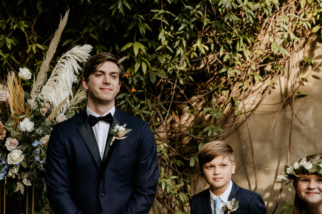 groom's reaction to seeing his bride walk down the aisle at summerour studio
