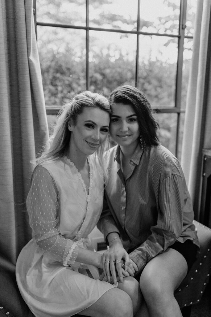 bride getting ready with bridesmaid at summerour studio in atlanta
