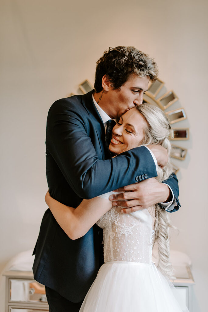 first look between bride and her brother at summerour studio