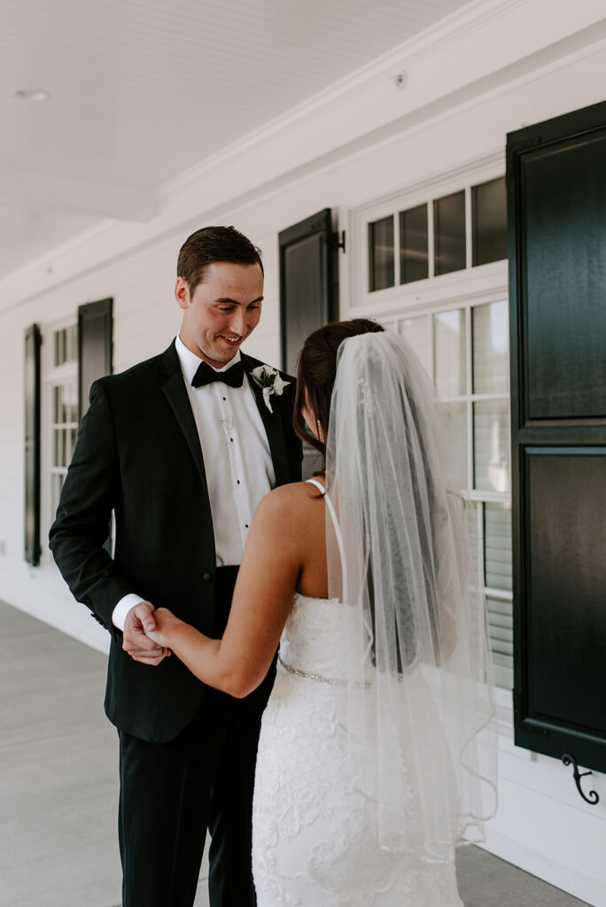 first look between the bride and groom at the reserve club in aiken south carolina