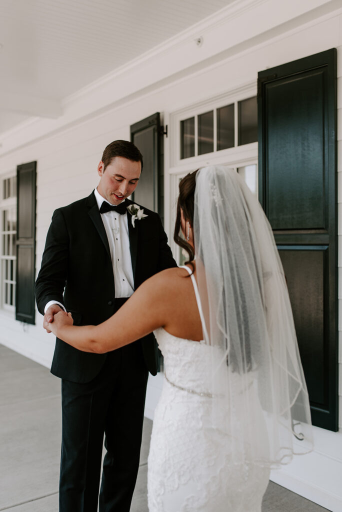 first look between the bride and groom at the reserve club in aiken south carolina