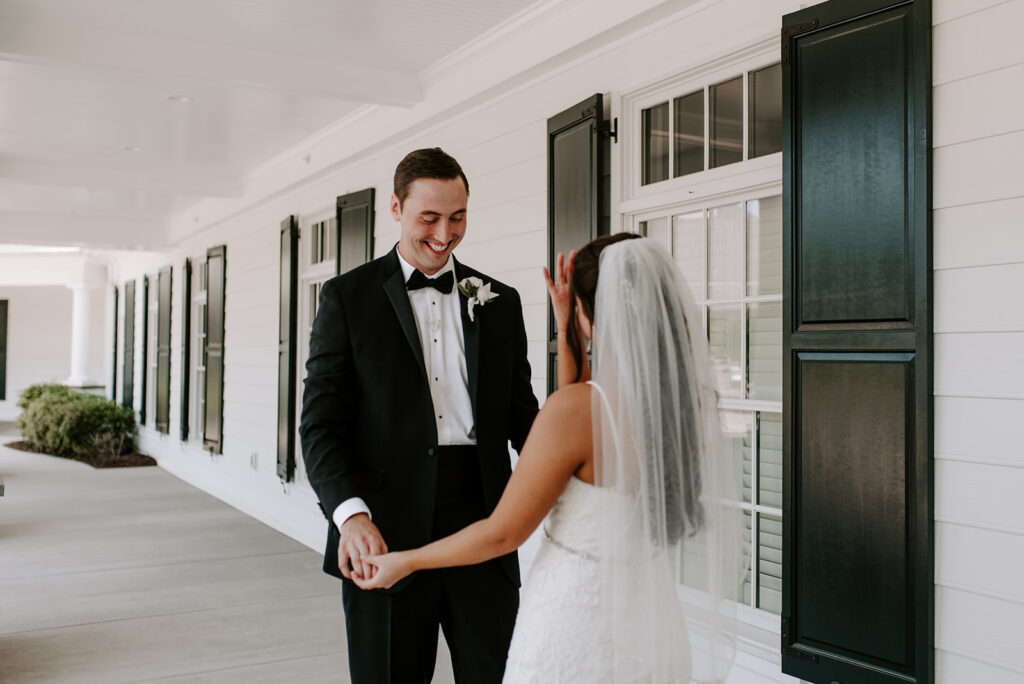 first look between the bride and groom at the reserve club in aiken south carolina