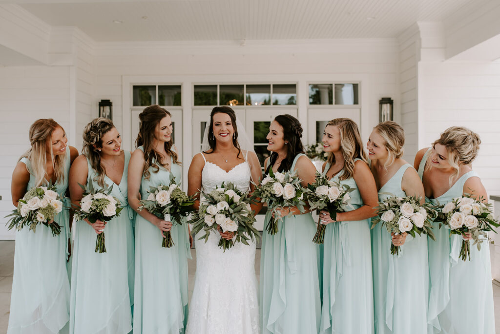 bridesmaids laughing with bride at the reserve club in aiken south carolina