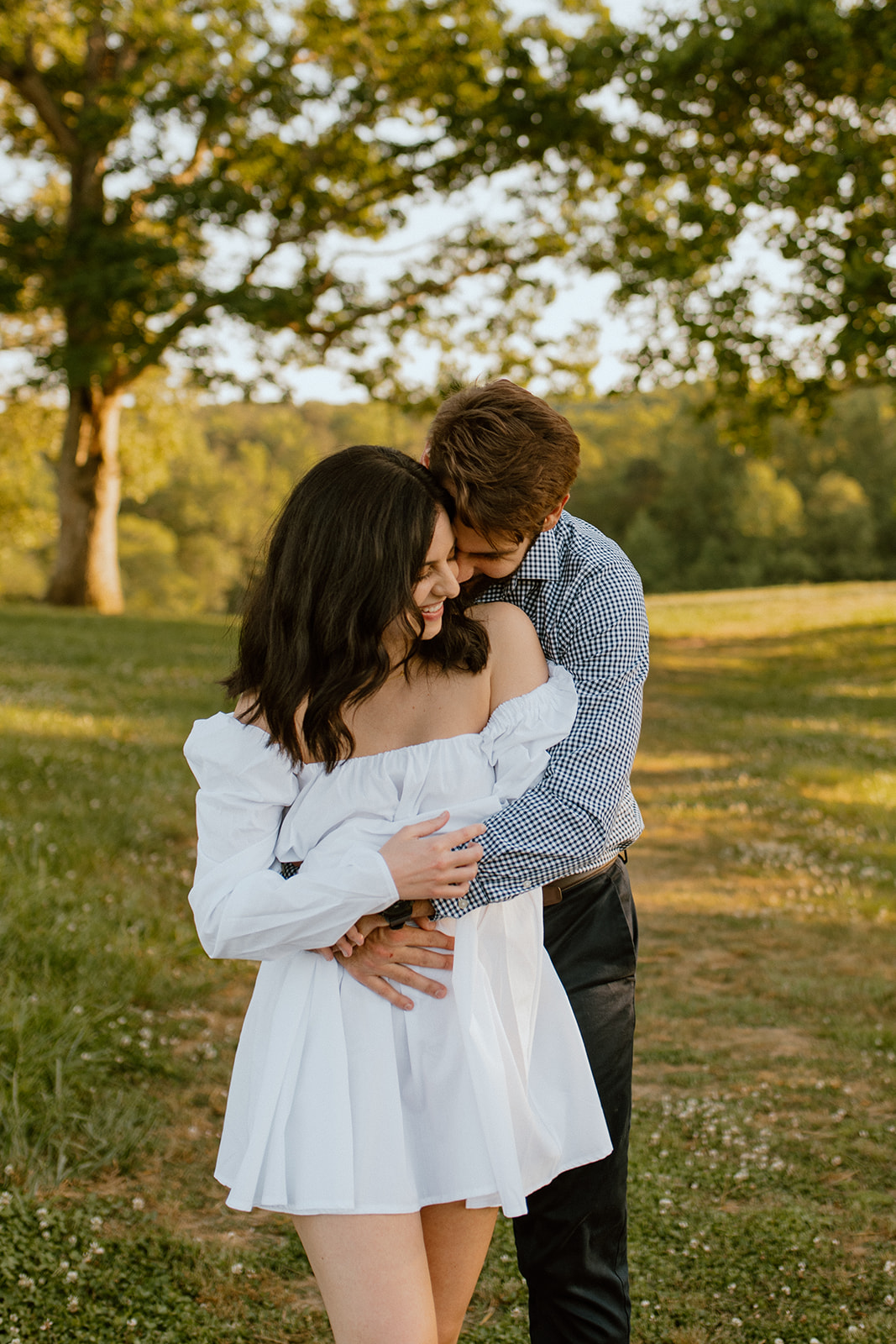 couple hugging in the park